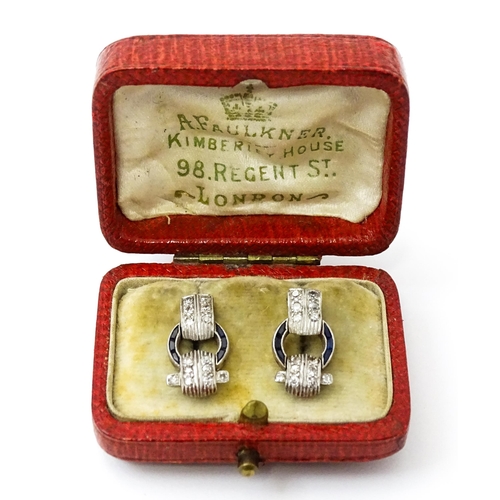 783 - A pair of Art deco style earrings set with  diamonds and sapphires. Approx 1/2