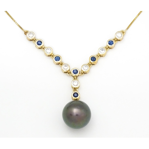 802 - A 9ct gold necklace set with sapphires and white zircon, with a Tahitian pearl drop, Approx. 19