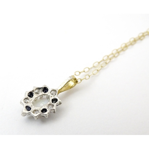 807 - A 9ct gold chain necklace together with an with opal pendant. Pendant approx. 3/8