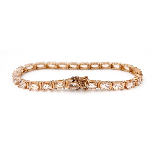 812 - A silver rose gilt bracelet set with morganite. Together with matching earrings. Bracelet approx. 7 ... 