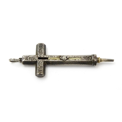 814 - A novelty white metal Sampson Mordan propelling pencil of pendant cross form with engraved decoratio... 