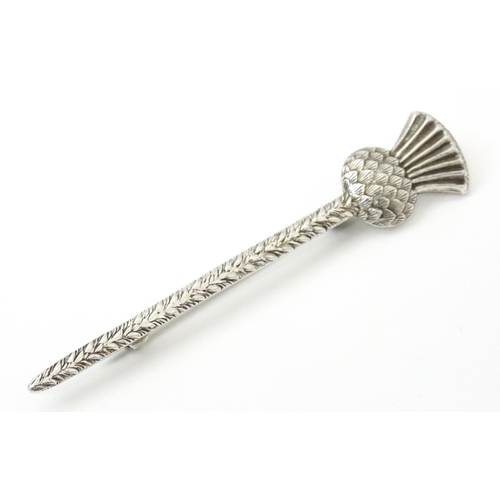 818 - A silver brooch kilt pin of Scottish thistle form hallmarked Birmingham 1921, maker F Narborough. Ap... 