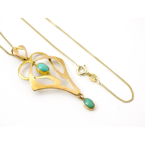 819 - An Art Nouveau 9ct gold pendant set with turquoise cabochon, with chain approx 19