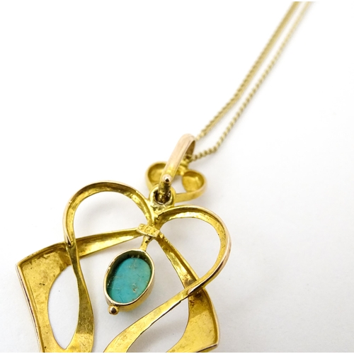 819 - An Art Nouveau 9ct gold pendant set with turquoise cabochon, with chain approx 19