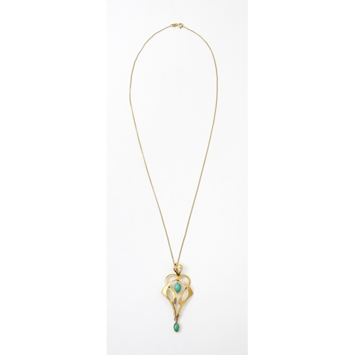 819 - An Art Nouveau 9ct gold pendant set with turquoise cabochon, with chain approx 19