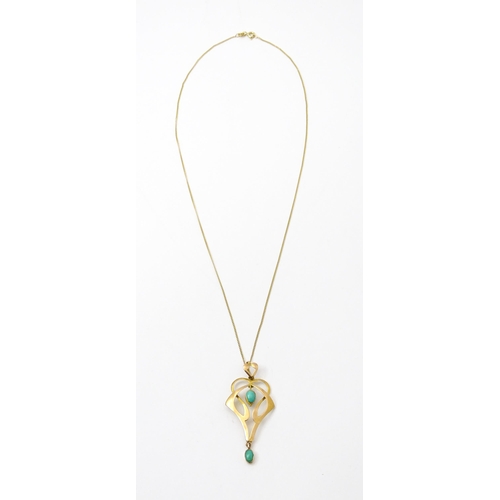 819 - An Art Nouveau 9ct gold pendant set with turquoise cabochon, with chain approx 19