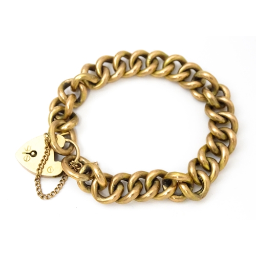 826 - A 9ct gold and yellow metal bracelet with 9ct gold padlock formed clasp Approx 7 1/2