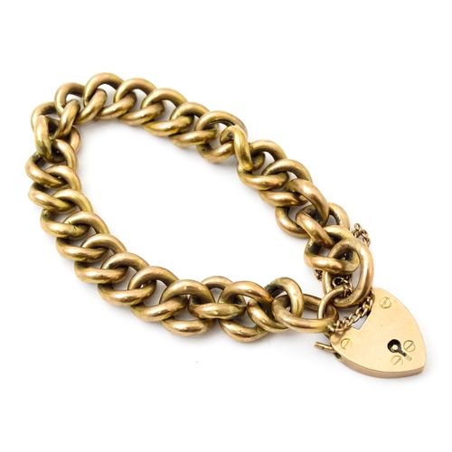 826 - A 9ct gold and yellow metal bracelet with 9ct gold padlock formed clasp Approx 7 1/2