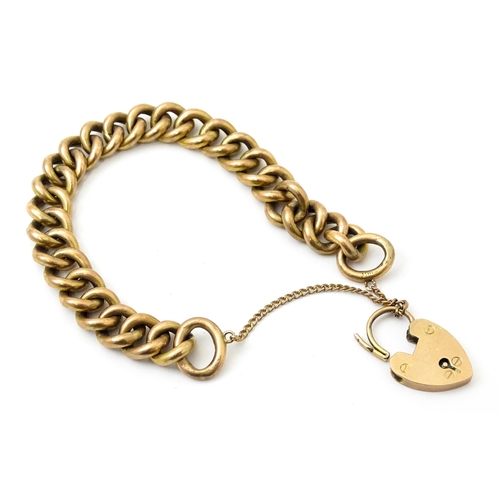 826 - A 9ct gold and yellow metal bracelet with 9ct gold padlock formed clasp Approx 7 1/2