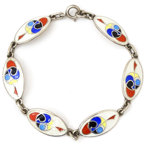 829 - An Irish silver bracelet with enamel decoration, hallmarked Dublin 1989, maker Tara Ware Ltd. Approx... 