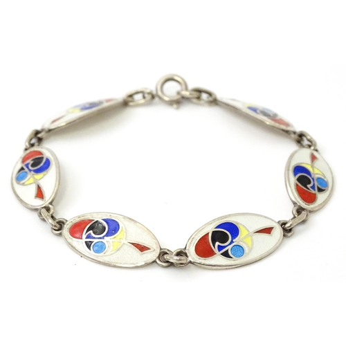 829 - An Irish silver bracelet with enamel decoration, hallmarked Dublin 1989, maker Tara Ware Ltd. Approx... 