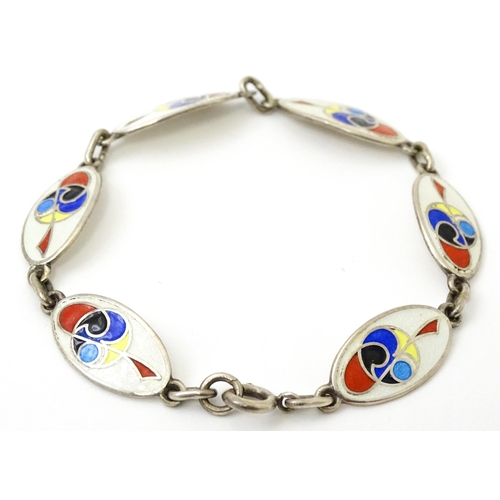 829 - An Irish silver bracelet with enamel decoration, hallmarked Dublin 1989, maker Tara Ware Ltd. Approx... 