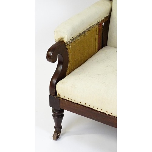 1836 - A Victorian mahogany reclining wingback armchair (John Ward patent) with scrolled arms and raised on... 