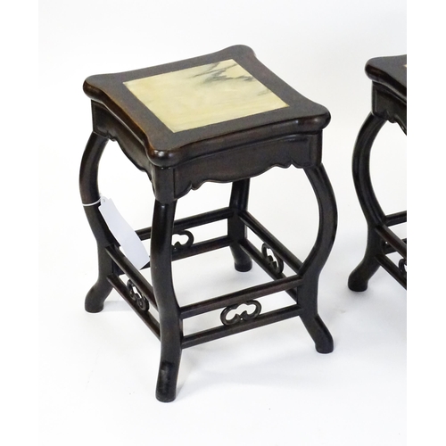 1870 - A mah-jong table and stools. Having marble tops above cabriole legs and double braced stretchers wit... 