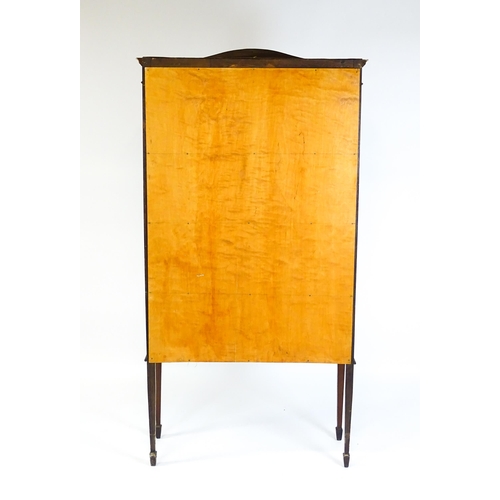 1875 - An Edwardian mahogany display cabinet with a shaped pediment, satinwood inlaid frieze and having two... 