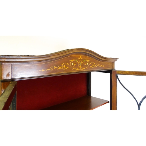 1875 - An Edwardian mahogany display cabinet with a shaped pediment, satinwood inlaid frieze and having two... 