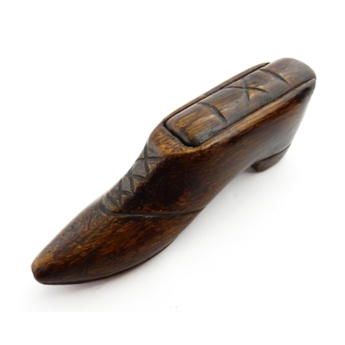 1373 - Treen : A 19thC shoe snuff box with sliding lid and incised decoration. Approx. 3 3/4