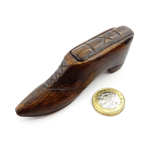 1373 - Treen : A 19thC shoe snuff box with sliding lid and incised decoration. Approx. 3 3/4