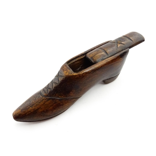 1373 - Treen : A 19thC shoe snuff box with sliding lid and incised decoration. Approx. 3 3/4