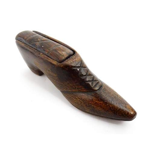 1373 - Treen : A 19thC shoe snuff box with sliding lid and incised decoration. Approx. 3 3/4