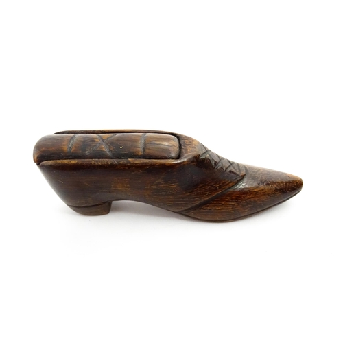 1373 - Treen : A 19thC shoe snuff box with sliding lid and incised decoration. Approx. 3 3/4