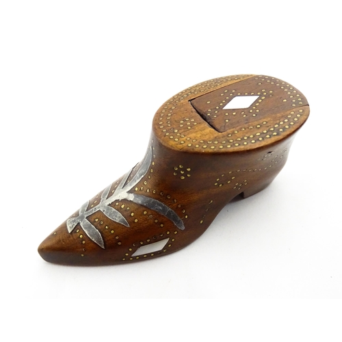 1376 - Treen : A 19thC shoe snuff box of unusual form with sliding lid, studwork decoration, inlaid mother ... 