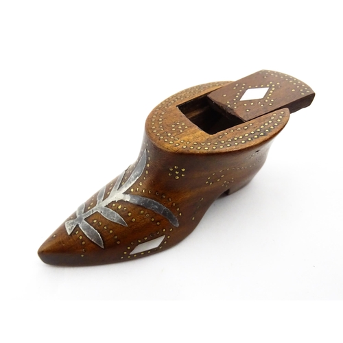 1376 - Treen : A 19thC shoe snuff box of unusual form with sliding lid, studwork decoration, inlaid mother ... 