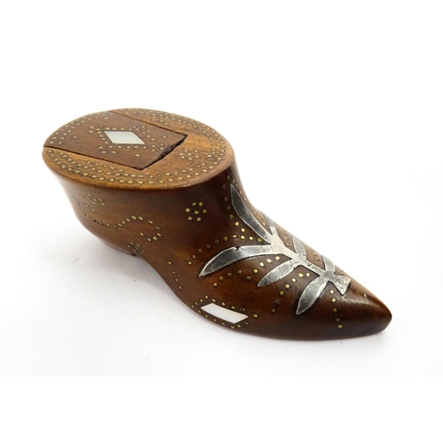 1376 - Treen : A 19thC shoe snuff box of unusual form with sliding lid, studwork decoration, inlaid mother ... 