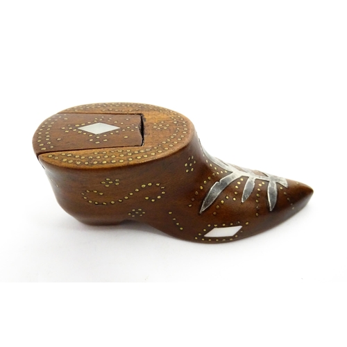 1376 - Treen : A 19thC shoe snuff box of unusual form with sliding lid, studwork decoration, inlaid mother ... 