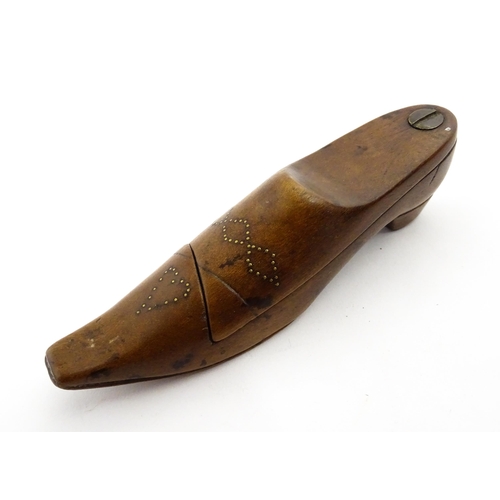 1377 - Treen : A 19thC shoe snuff box with pivoting lid and inlaid studwork decoration. Approx. 4