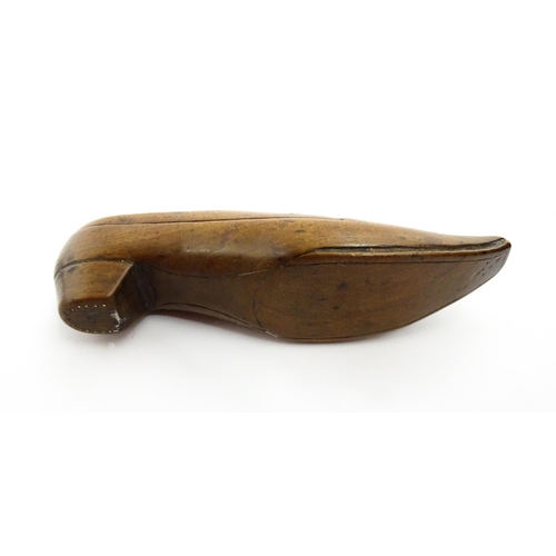 1377 - Treen : A 19thC shoe snuff box with pivoting lid and inlaid studwork decoration. Approx. 4