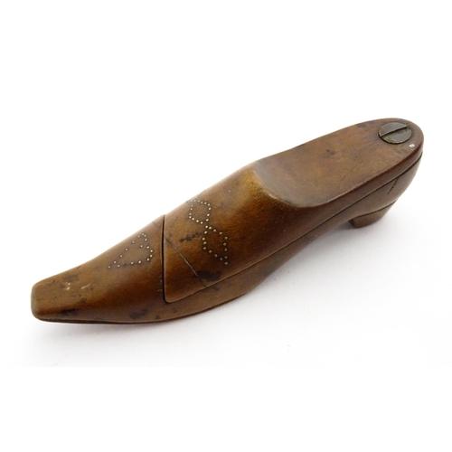 1377 - Treen : A 19thC shoe snuff box with pivoting lid and inlaid studwork decoration. Approx. 4