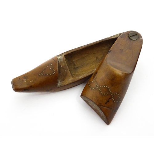 1377 - Treen : A 19thC shoe snuff box with pivoting lid and inlaid studwork decoration. Approx. 4