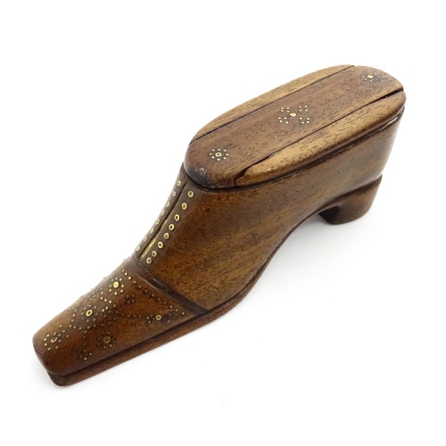 1378 - Treen : A 19thC shoe snuff box with sliding lid and inlaid brass studwork decoration. Approx. 4 1/2