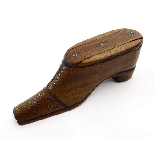 1378 - Treen : A 19thC shoe snuff box with sliding lid and inlaid brass studwork decoration. Approx. 4 1/2