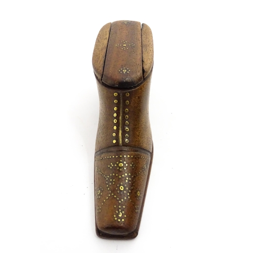 1378 - Treen : A 19thC shoe snuff box with sliding lid and inlaid brass studwork decoration. Approx. 4 1/2