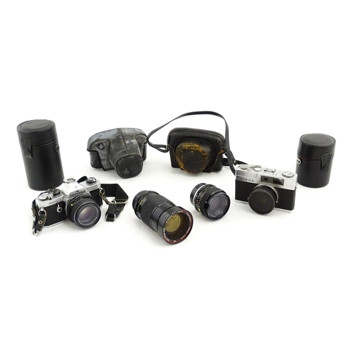 1400 - A quantity of cameras and lenses to include a Pentax Asahi MX 35mm SLR Camera, a Konica EE-Matic 35m... 