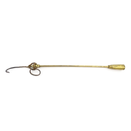 1402 - A 19thC brass beam weighing scale, with hook, loop and counterbalance, marked up to 150 ounces in di... 