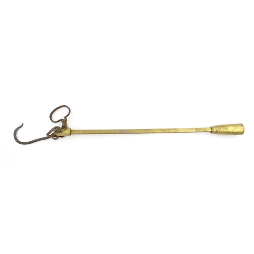 1402 - A 19thC brass beam weighing scale, with hook, loop and counterbalance, marked up to 150 ounces in di... 