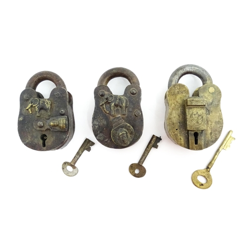 1408 - Three late 19th / early 20thC Indian padlocks comprising two with relief elephant detail and deity d... 