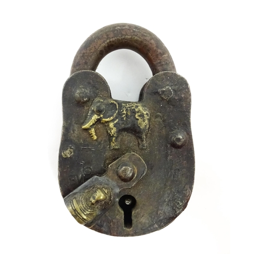 1408 - Three late 19th / early 20thC Indian padlocks comprising two with relief elephant detail and deity d... 