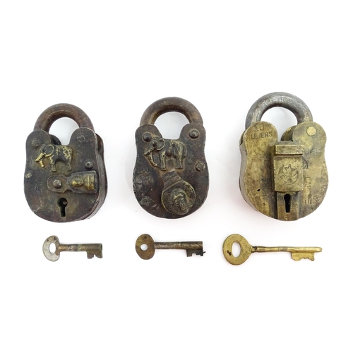 1408 - Three late 19th / early 20thC Indian padlocks comprising two with relief elephant detail and deity d... 