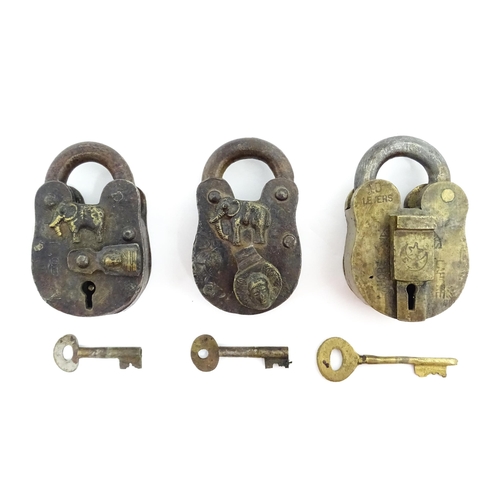 1408 - Three late 19th / early 20thC Indian padlocks comprising two with relief elephant detail and deity d... 