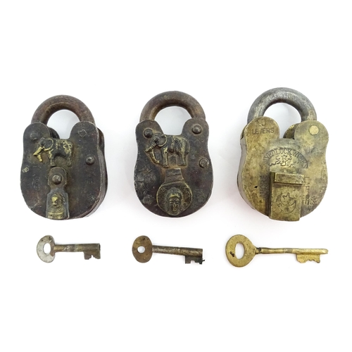 1408 - Three late 19th / early 20thC Indian padlocks comprising two with relief elephant detail and deity d... 