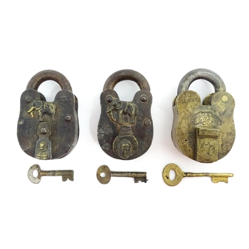 1408 - Three late 19th / early 20thC Indian padlocks comprising two with relief elephant detail and deity d... 