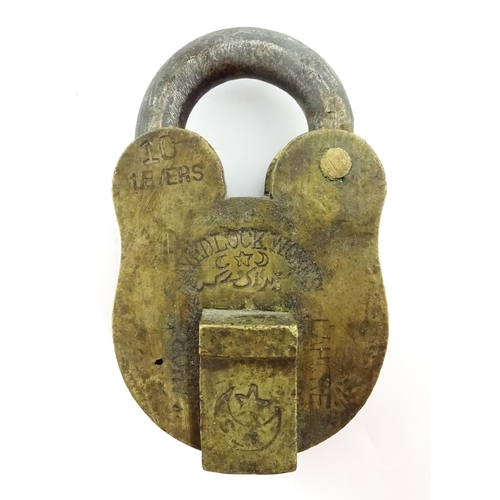 1408 - Three late 19th / early 20thC Indian padlocks comprising two with relief elephant detail and deity d... 