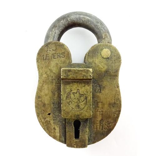 1408 - Three late 19th / early 20thC Indian padlocks comprising two with relief elephant detail and deity d... 