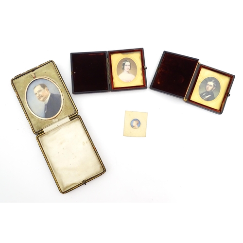 1415 - A pair of 19thC watercolour portrait miniatures depicting husband and wife, the gentleman wearing a ... 