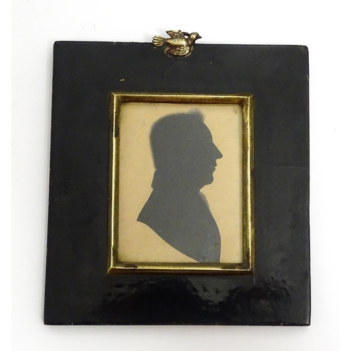 1417 - An early 20thC silhouette portrait depicting a gentleman in profile, and another similar signed Jon ... 