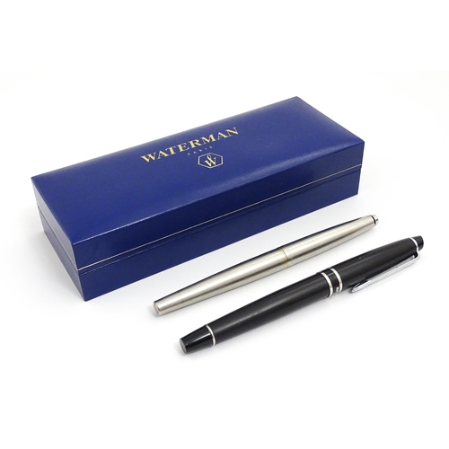 1425 - A boxed Waterman ball point pen, together with a Parker '45' fountain pen, the largest approx 5 1/4